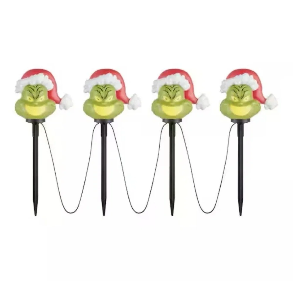 Gemmy Christmas Grinch Battery-Operated Pathway Stakes (4 Count) With Santa Hat‎